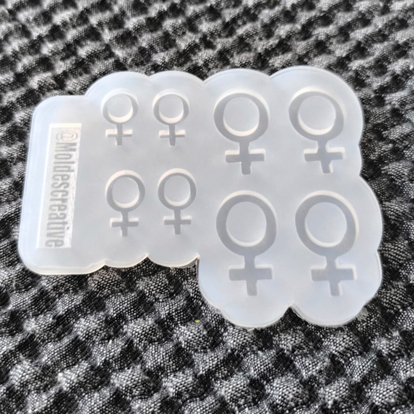 Molde símbolo mujer
