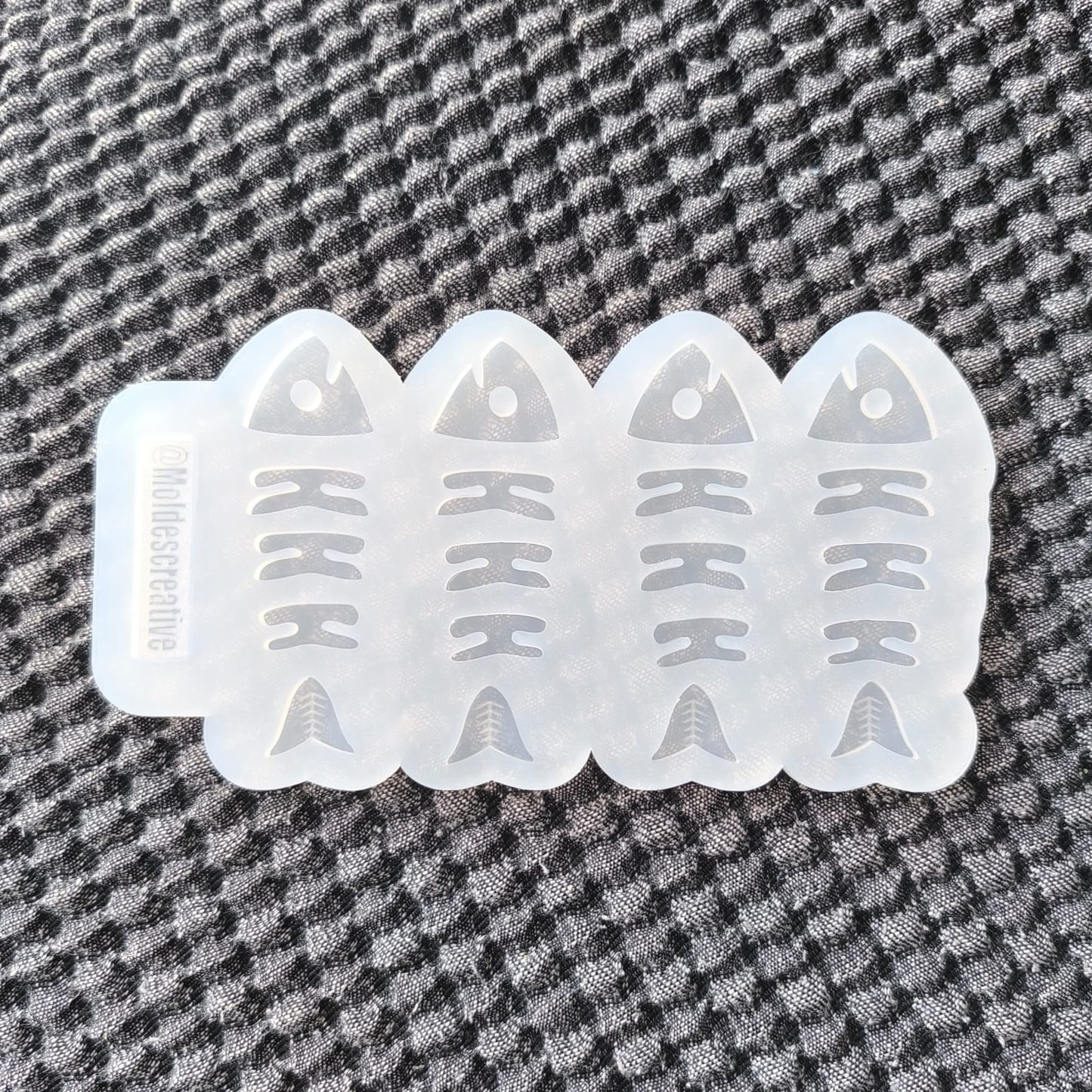 Molde raspa de pez articulada